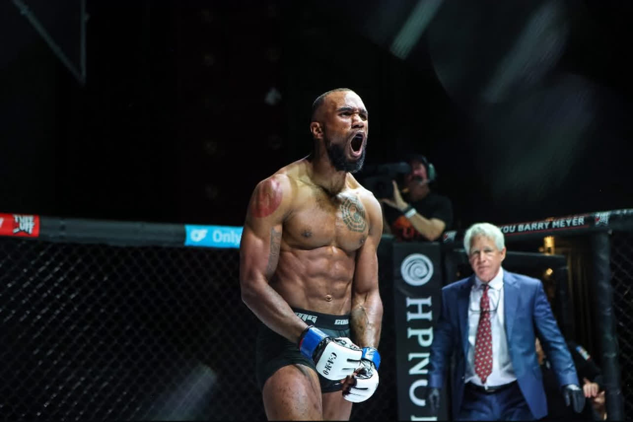 Pro MMA fighter Darryl "The Sacred Beast" Walker roaring in the cage after a fight